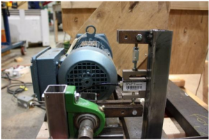 Motor mount swing, torque arm, and force transducer